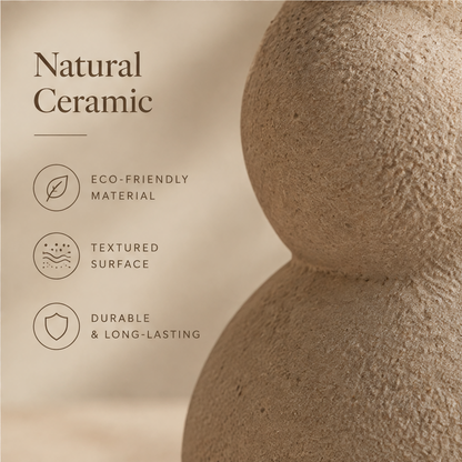 Close-up of the ceramic bubble vase showing its cream-colored textured surface